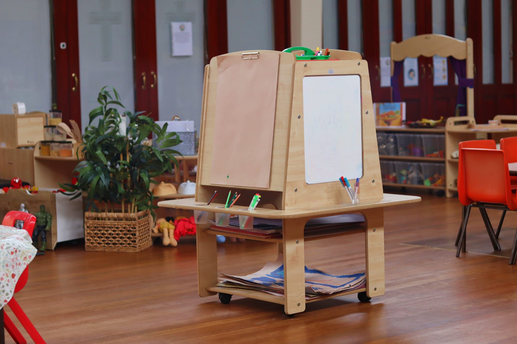 Art easel and creative activities at Maygardens Little Learners nursery